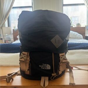 The North Face Black and Beige Travel Backpack